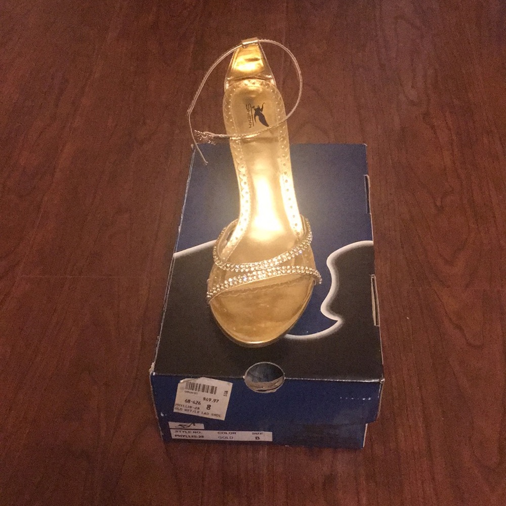 Gold heels with rhinestone accents